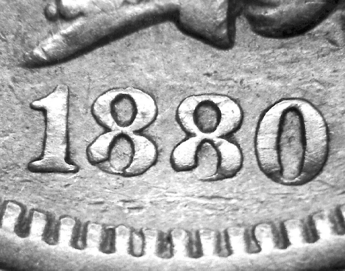 1880 Indian Head penny Misplaced Date — partial digit visible in denticles below the date